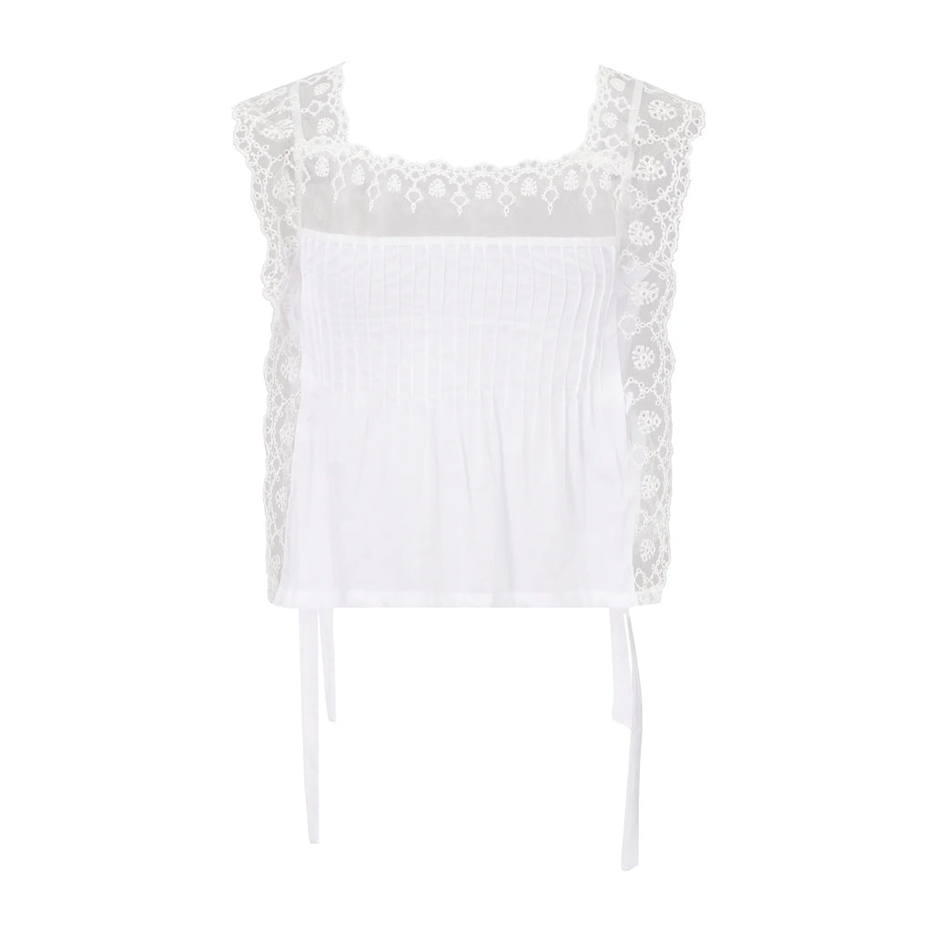 Women's white crop top with lace detailing, perfect for summer outings