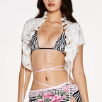 Women's white crop top with ruffle details, perfect for summer outfits