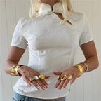 Women's white crop top with unique button design for casual wear