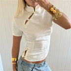 Women's white crop top with decorative buttons for casual wear