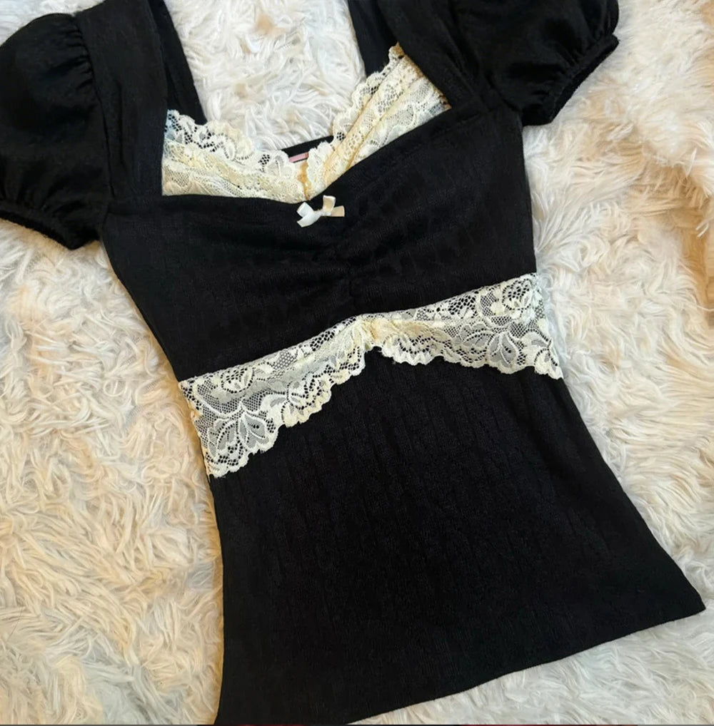 Women's black crop tops with lace trim, stylish for casual outings