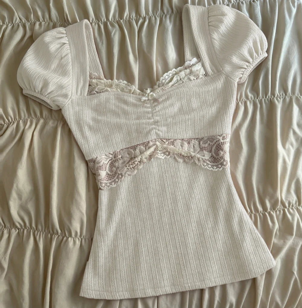 Women's cream crop tops with lace detailing, stylish for casual outings