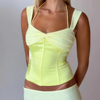 Women's yellow satin crop tops, perfect for summer outings