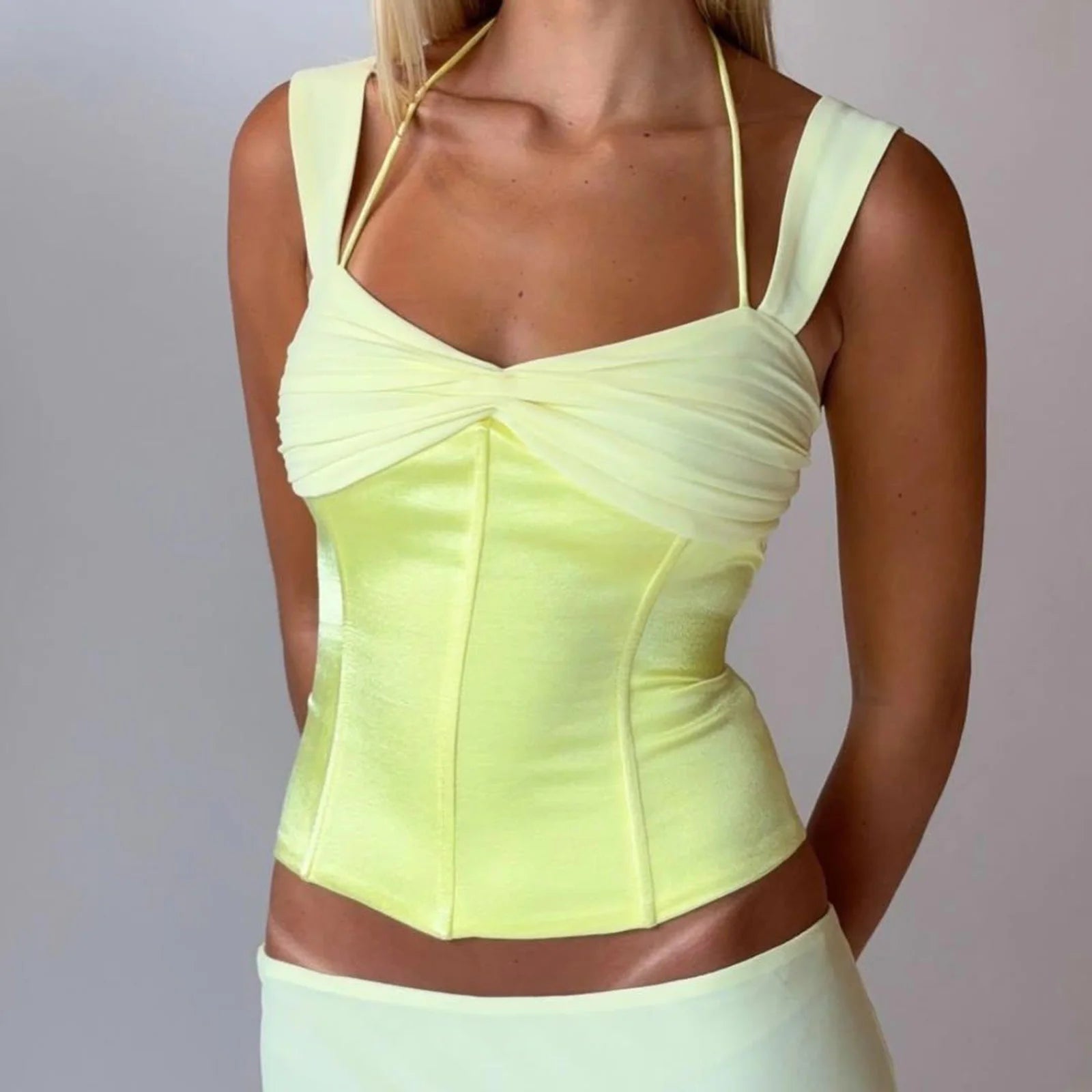 Women's yellow satin crop tops, perfect for summer outings