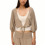 Women's cropped top in beige, soft material for casual outings
