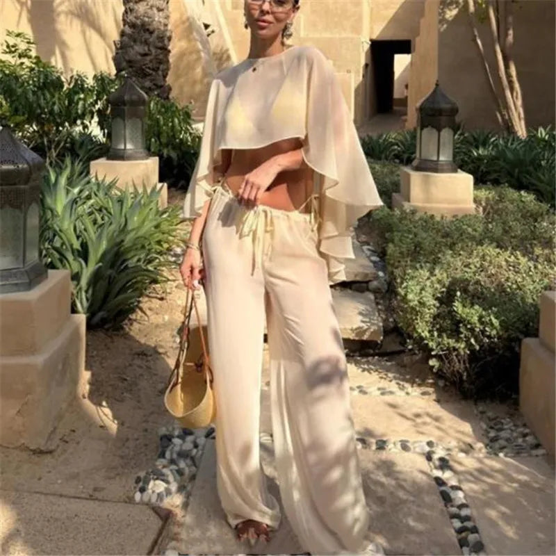 Women's cropped top and airy pants set, perfect for vacation outings