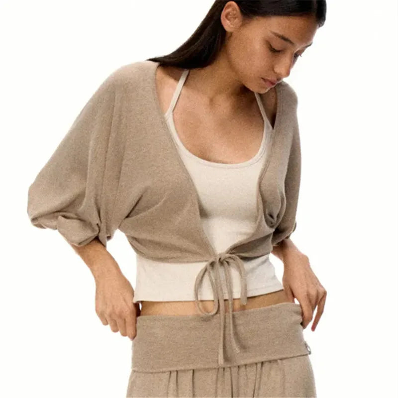 Women's beige cropped top, lightweight fabric, stylish for casual outings