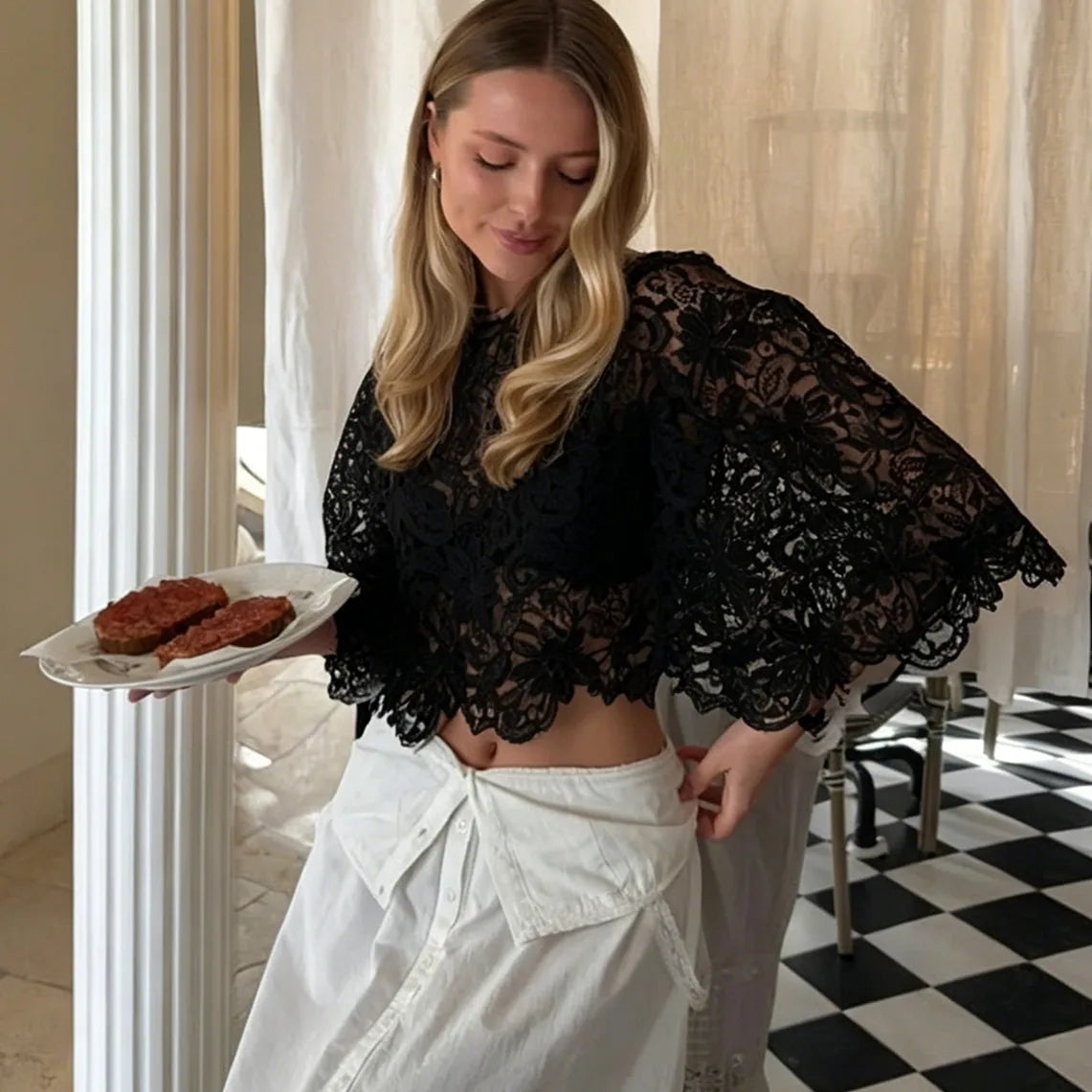 Women's black cropped top, lace material, stylish for summer outings
