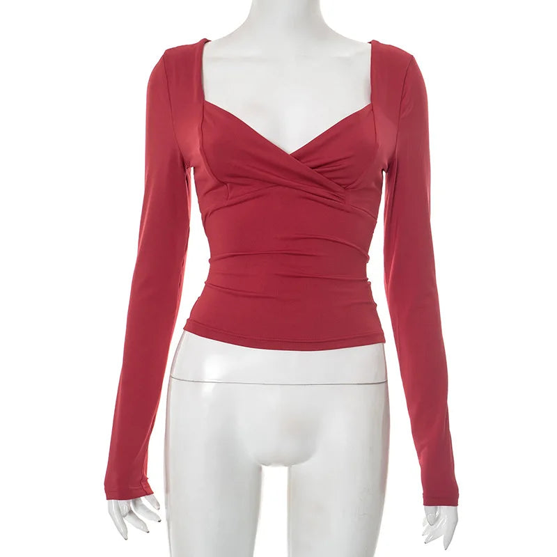 Women's red long-sleeve cropped top, perfect for casual outings