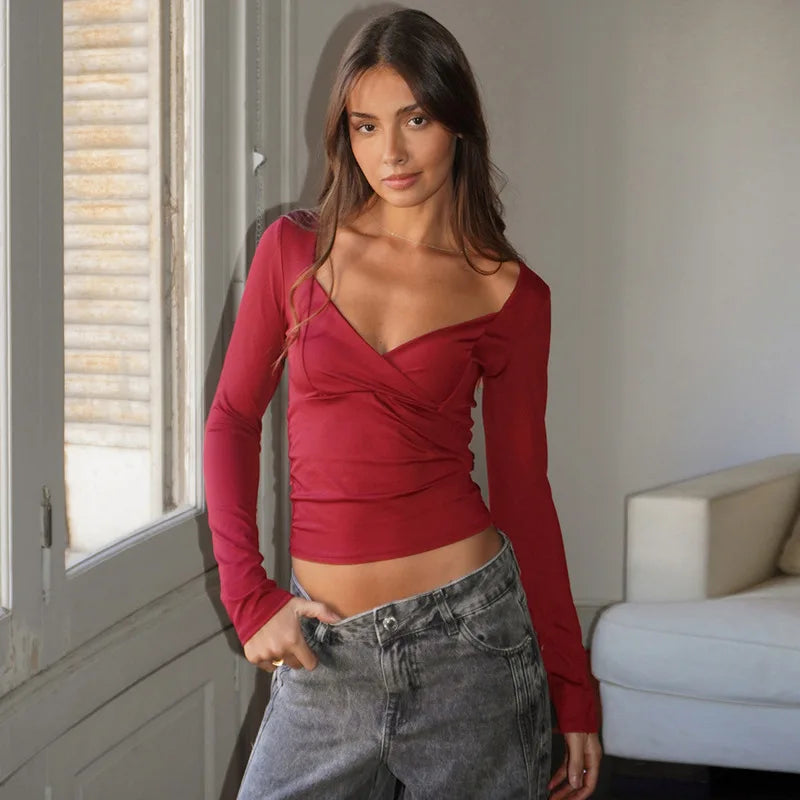 Women's burgundy cropped top in soft fabric, perfect for casual outings