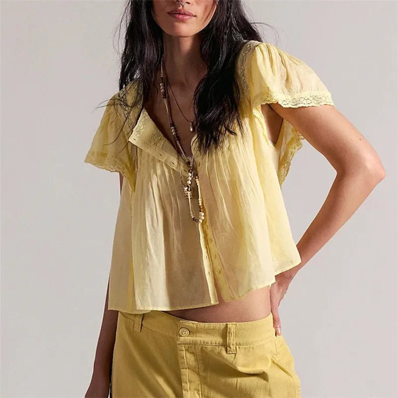 Women's yellow cropped top in lightweight fabric, perfect for summer days