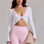 White long-sleeve cropped tops for stylish workouts or casual outings