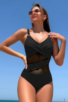 Women's cross lace V neck swimsuit in black with mesh detailing for stylish beachwear