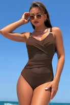 Brown women's swimwear featuring a cross lace V neck swimsuit design ideal for beach outings