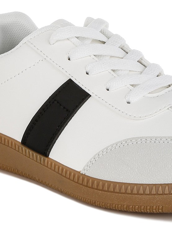 Women's crossover classic lace-up flatform sneaker in white with black accents