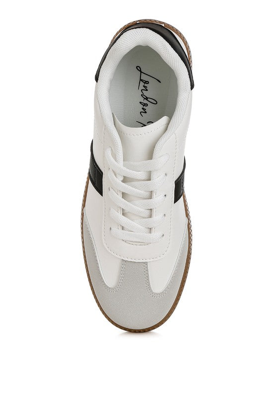 Women's crossover classic lace-up flatform sneaker in white and black