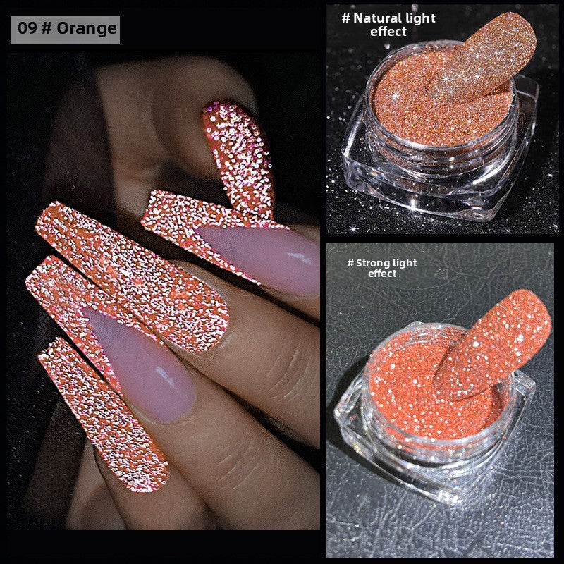 Crushed diamond nail powder in orange with swatches showing natural and strong light effects