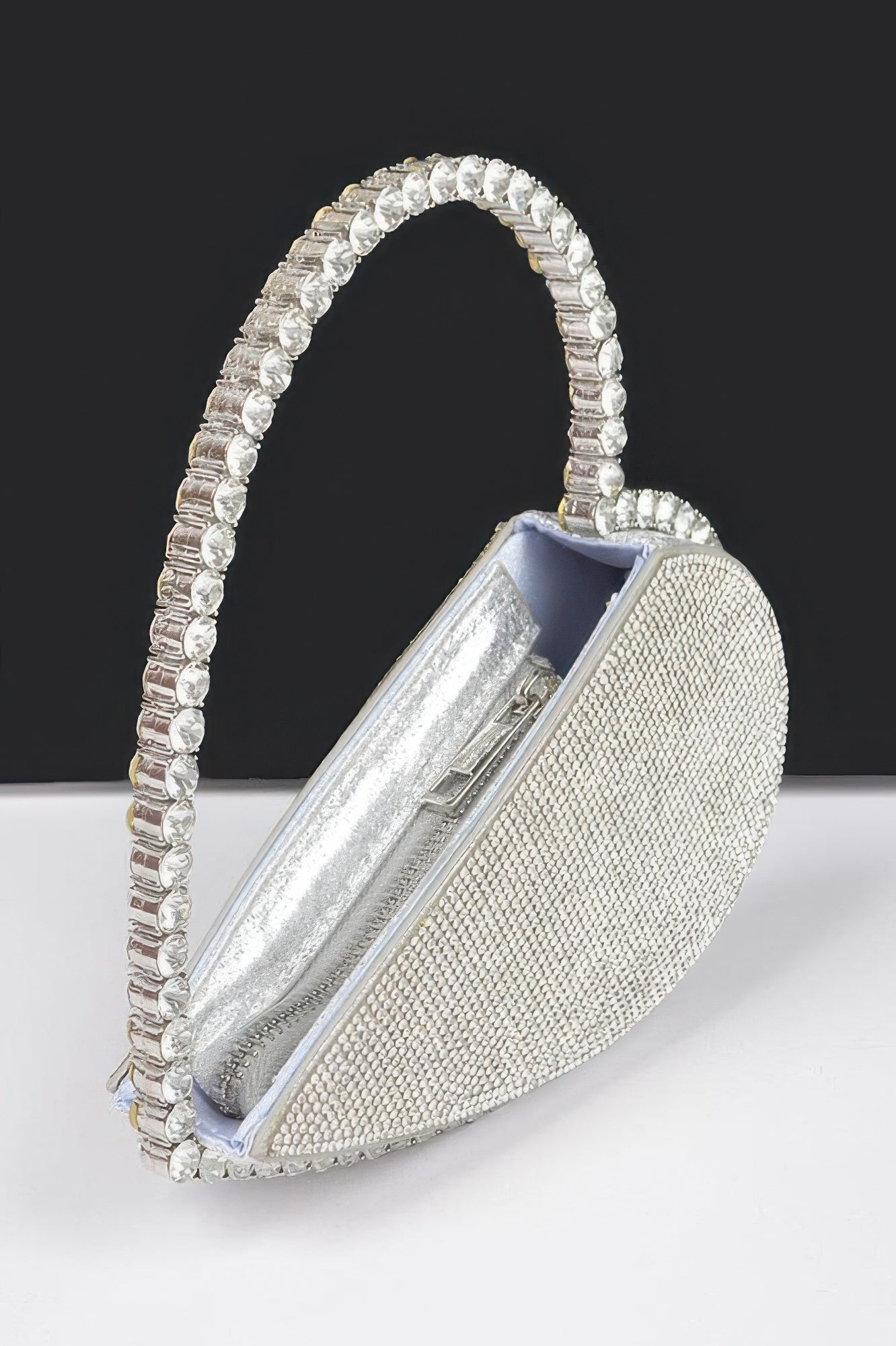 Sparkling crystal heart purse for parties with a stylish handle and elegant design