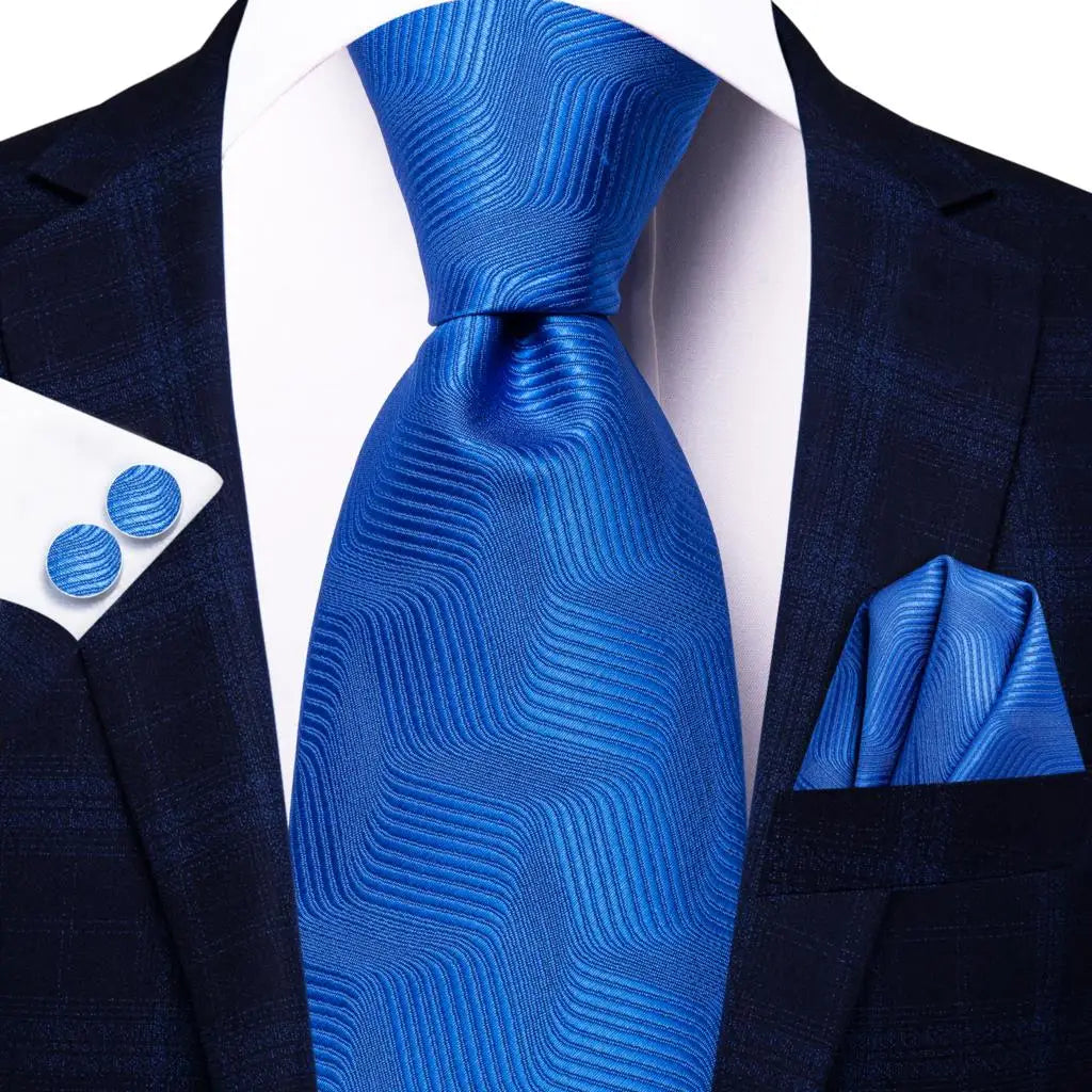 Stylish blue cufflinks cufflinks for formal occasions, paired with a tie