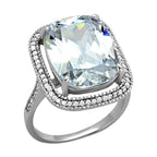 Cushion cut silver cocktail ring surrounded by sparkling stones for elegant evening wear