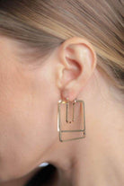 Elegant cut out geometric earrings for women in gold, perfect for any stylish occasion