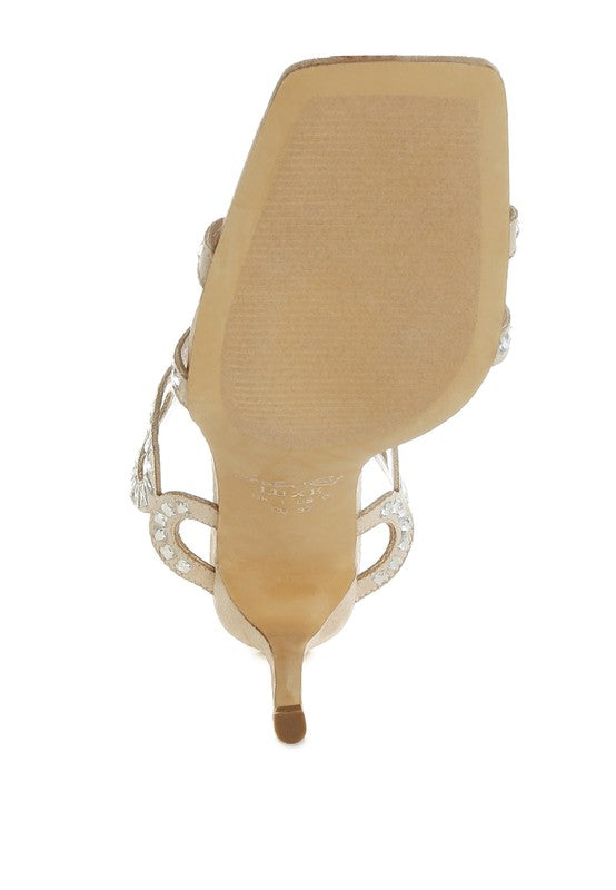 Beige cut out stiletto heel sandals with elegant embellishments