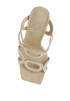 Women's cut out stiletto heel sandals in beige with stylish embellishments