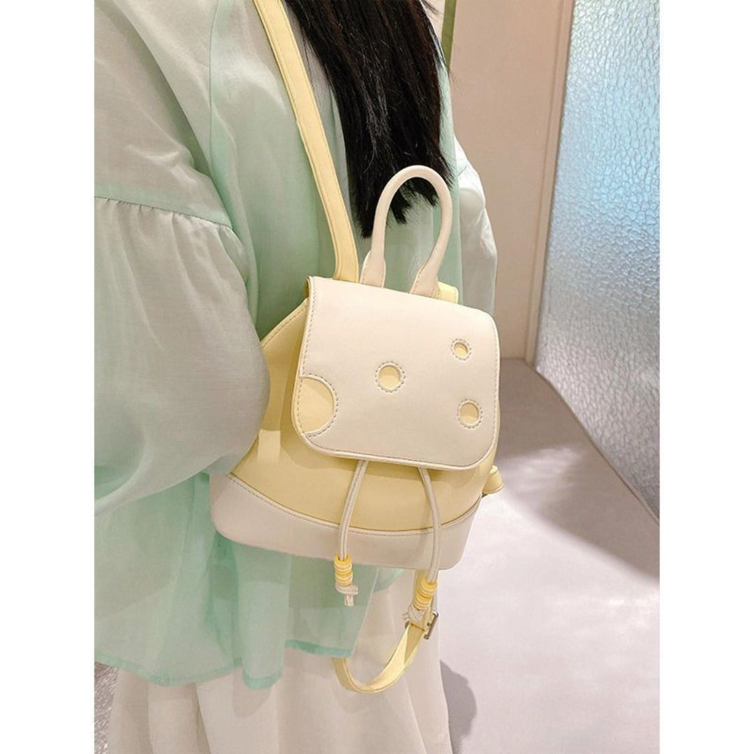 Cute cheese backpack in yellow and white design, perfect for fashion-forward enthusiasts