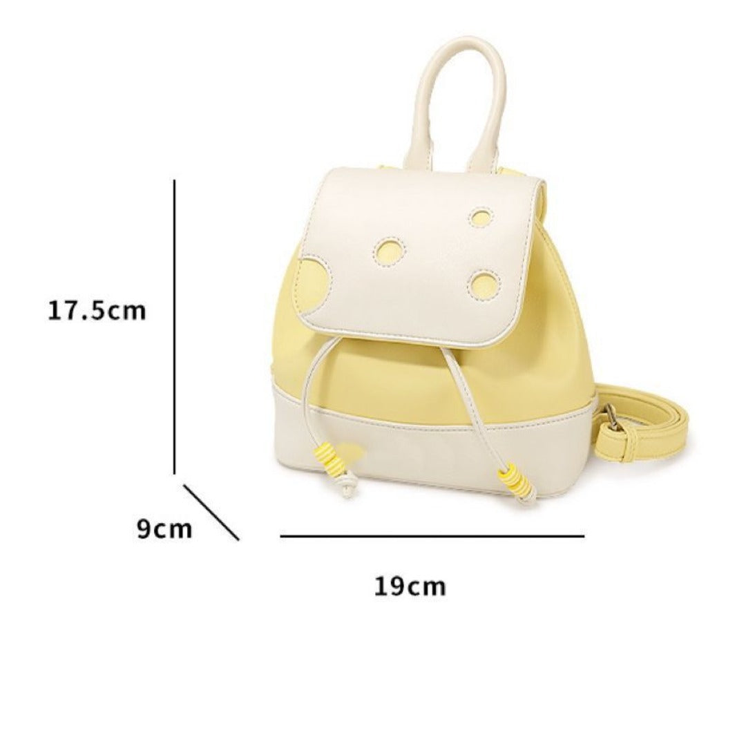 Cute cheese backpack in yellow and white with playful dot design and adjustable straps