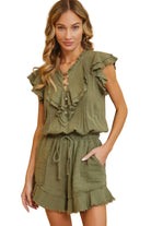 Cute summer ruffle romper in olive green with button details and pockets for a stylish look