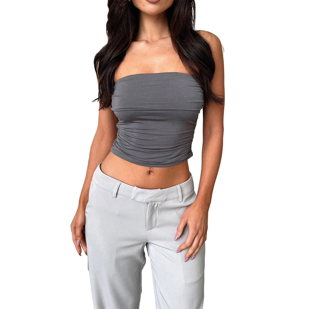 Woman wearing a gray daily wear soft bandeau shirt paired with light gray pants on white background