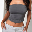 Grey daily wear soft bandeau shirt worn by woman paired with light grey pants