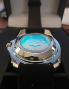 Dapr men's automatic watch with a striking blue dial and stainless steel case in a display box
