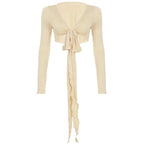 Womens cropped tie front top in beige with long sleeves and extended tie detail from VacationGrabs