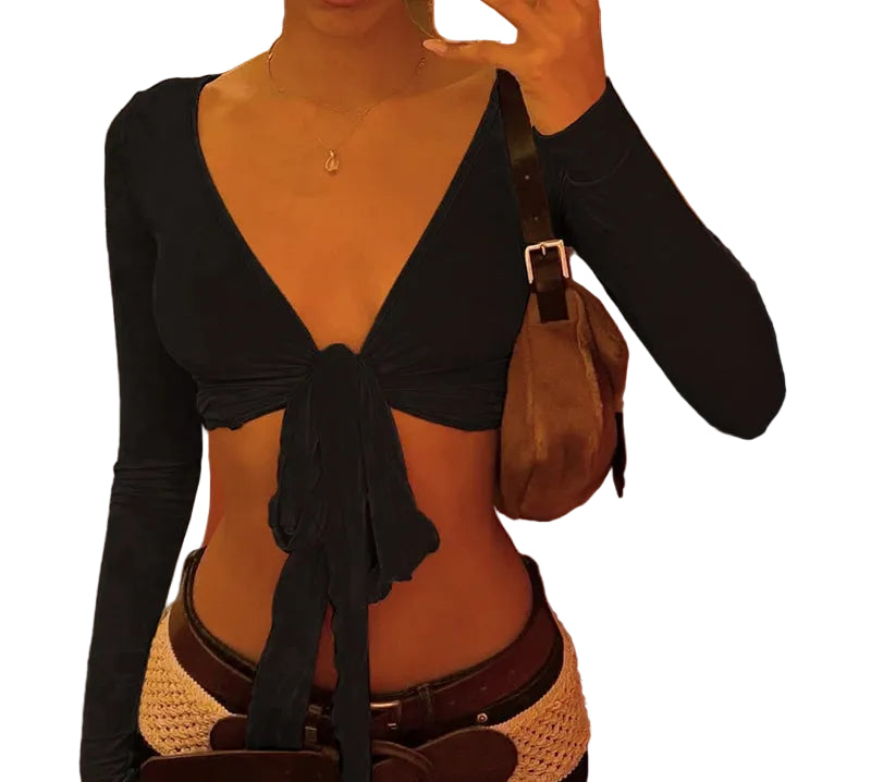 Womens cropped tie front top in black with long sleeves styled with brown belt and handbag
