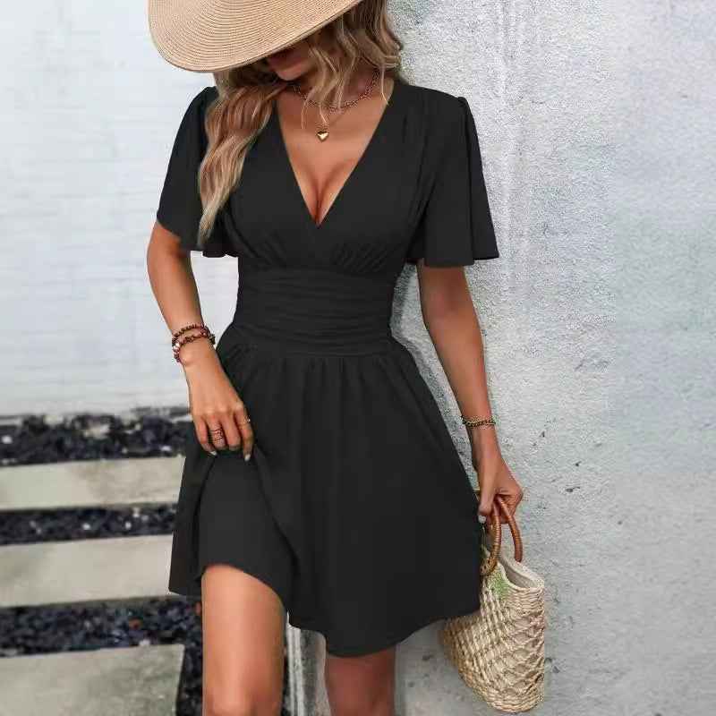 Elegant deep v waist pleated dress in black, perfect for summer outings and casual events