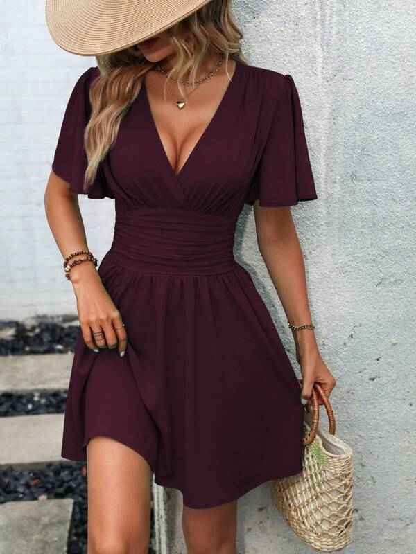 Elegant burgundy deep v waist pleated dress with flutter sleeves for a stylish summer look