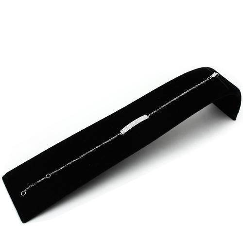 Delicate rhodium bracelet for gifting showcased on a black velvet display