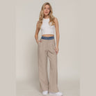 VacationGrabs women's denim accent wide leg pants in beige with blue denim waistband