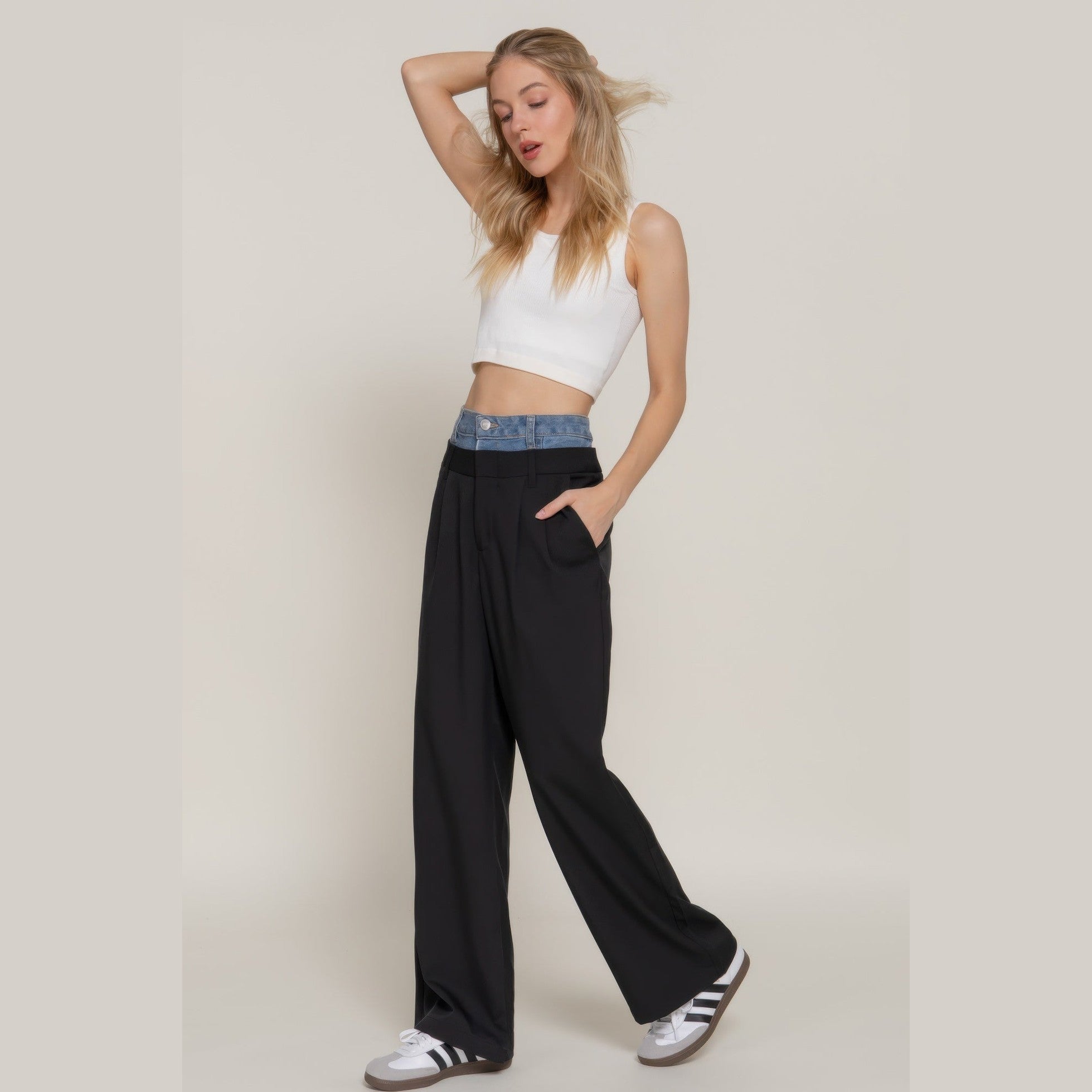 Women's denim accent wide leg pants by VacationGrabs styled with a white crop top and casual sneakers