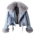 Denim jacket with fur trim on a white background