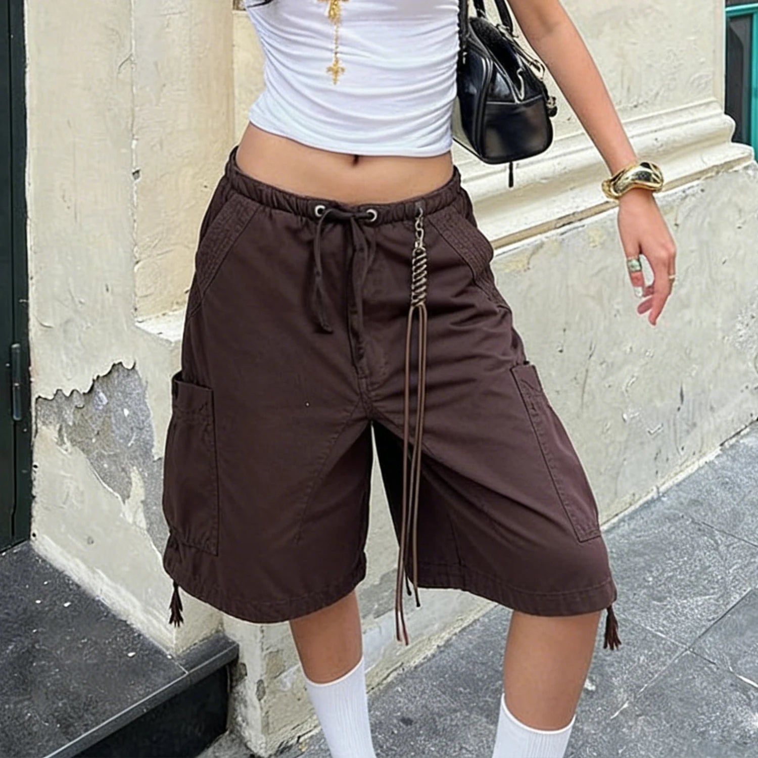 Women's brown denim shorts with pockets, perfect for casual outings