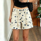 Women's beige shorts in denim with polka dots for casual outings