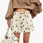 Women's denim shorts with polka dots, perfect for summer outings