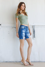 Women's distressed shorts in denim for casual summer outings