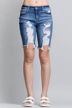Women's distressed denim shorts in blue, perfect for casual outings