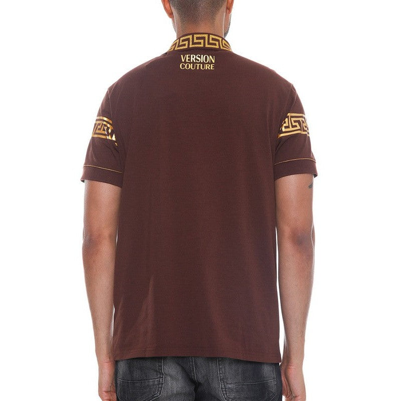 Back view of a brown designer polo button down shirt with gold geometric patterns and Version Couture branding
