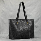 Stylish black embossed designer shoulder bag for laptops with durable handles and spacious interior