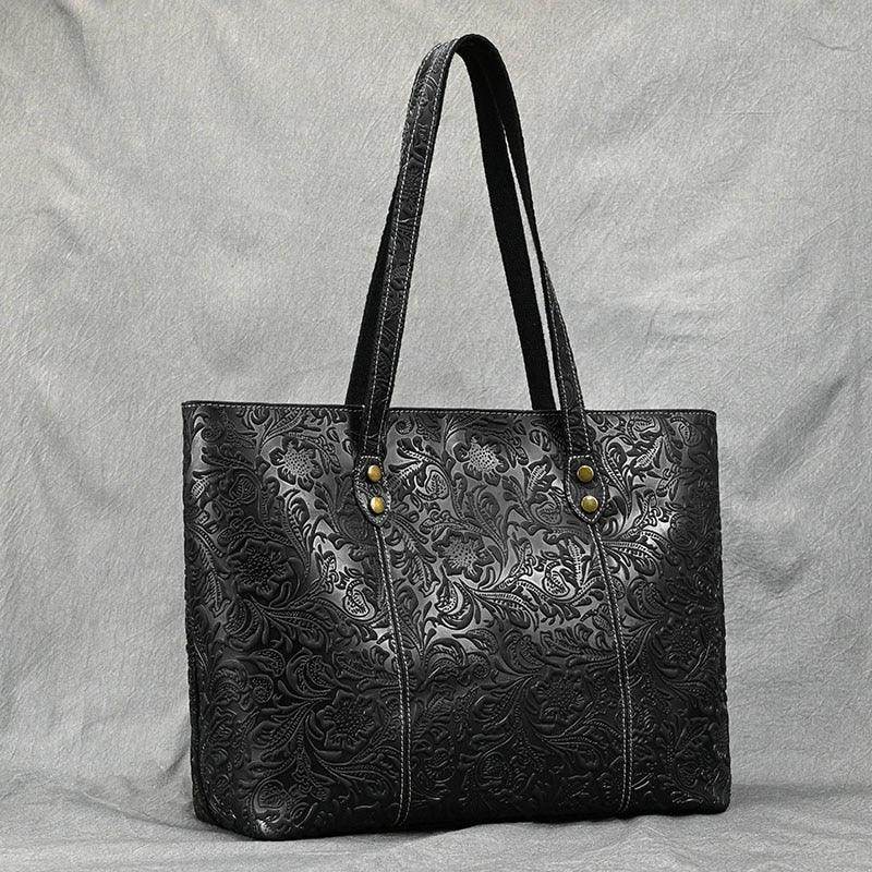 Stylish black embossed designer shoulder bag for laptops with durable handles and spacious interior