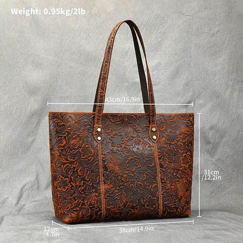 Stylish brown designer shoulder bag for laptops with intricate embossed design and ample storage
